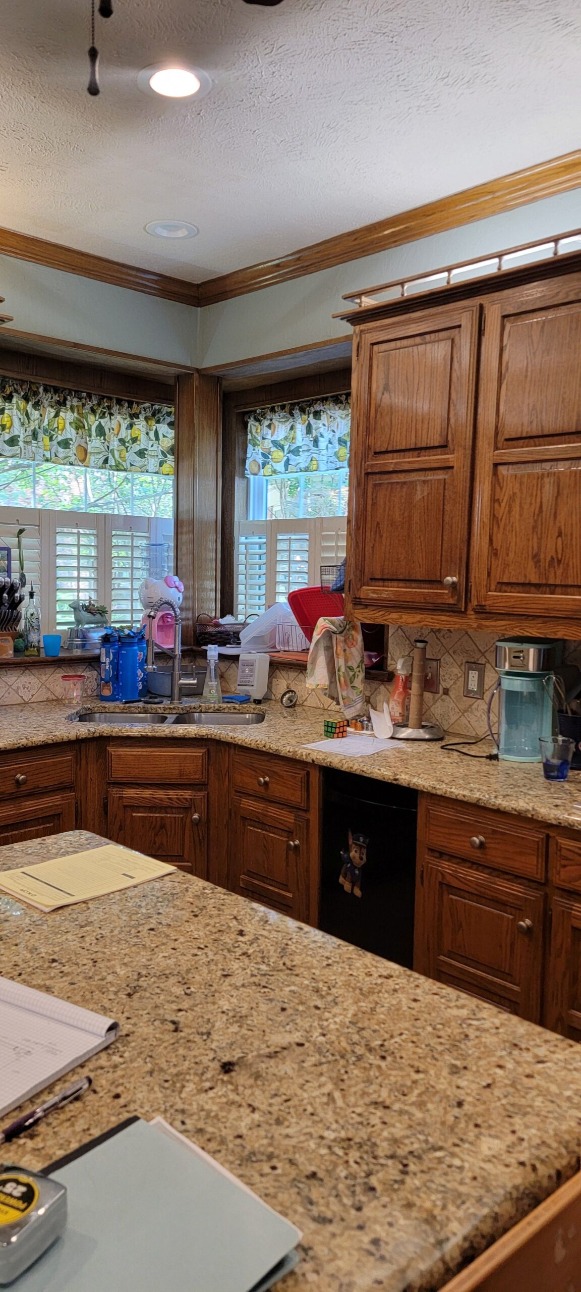 Home Remodel 2. Jewel-Tone Range Wall With Green And White Marble Mosaic Backsplash And Beveled Tile Surround