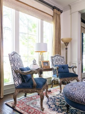 Traditional dining room with custom upholstered chairs, refined finishes, and timeless Dallas interior design