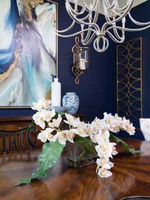 Traditional dining room with custom upholstered chairs, refined finishes, and timeless Dallas interior design
