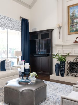 Traditional Dallas living room design with neutral palette and custom furnishings by Twilly & Fig.