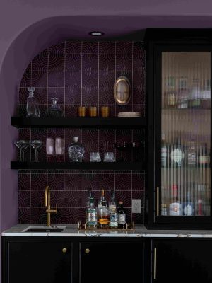 Deep Dark Cabinetry And Backsplash Tile